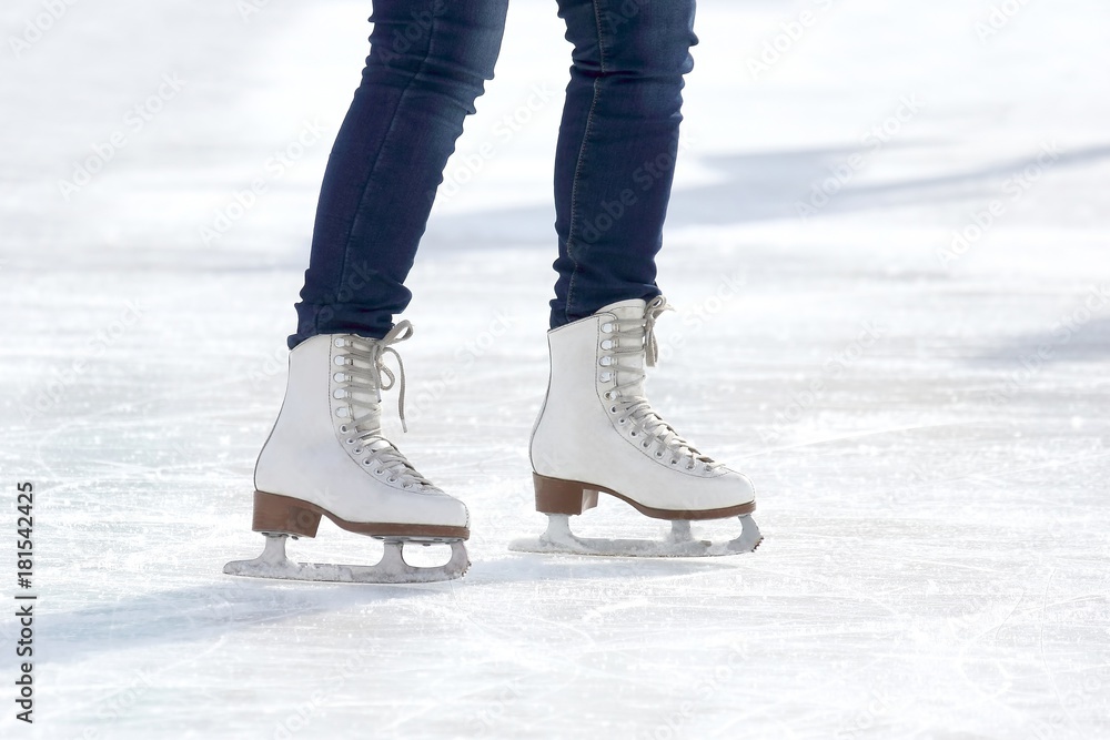 feet skating girl skating on ice rink. feet skating girl skating on ice rink.