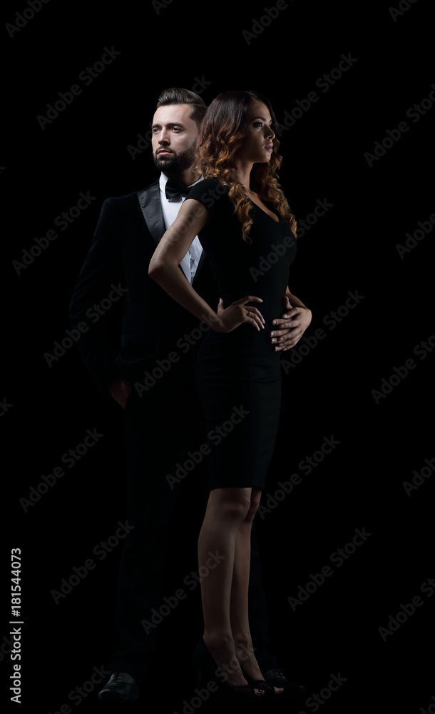 Hot girl in a black dress next to a businessman Hot girl in a black dress next to a businessman