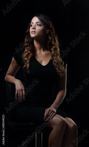 Studio shoot of beauty woman posing on the chair © ASDF