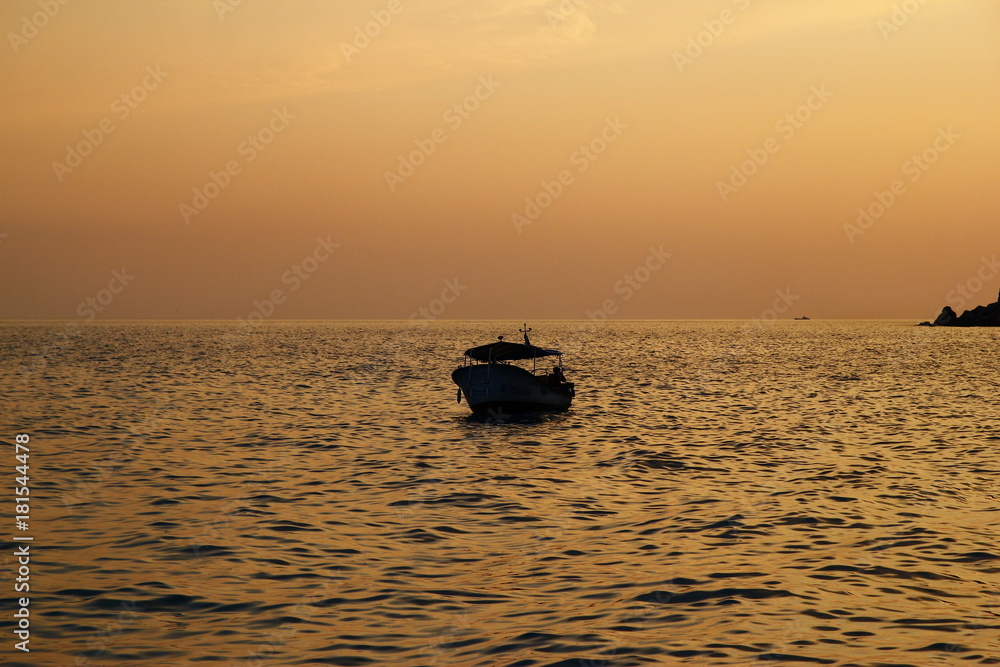 Beautiful sunset, rocky coast of Cape Fiolent. Dramatic scene. Crimea Beautiful sunset, rocky coast of Cape Fiolent. Dramatic scene. Crimea