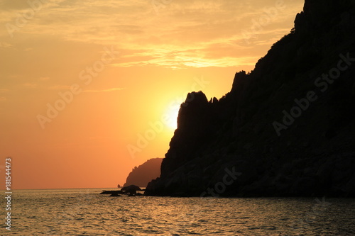Beautiful sunset  rocky coast of Cape Fiolent. Dramatic scene. Crimea