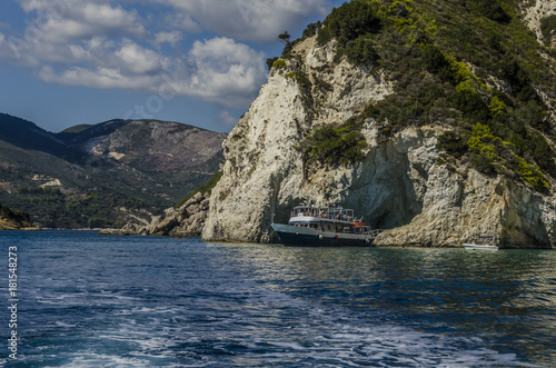 Tourist boat leaving zakynthos cave