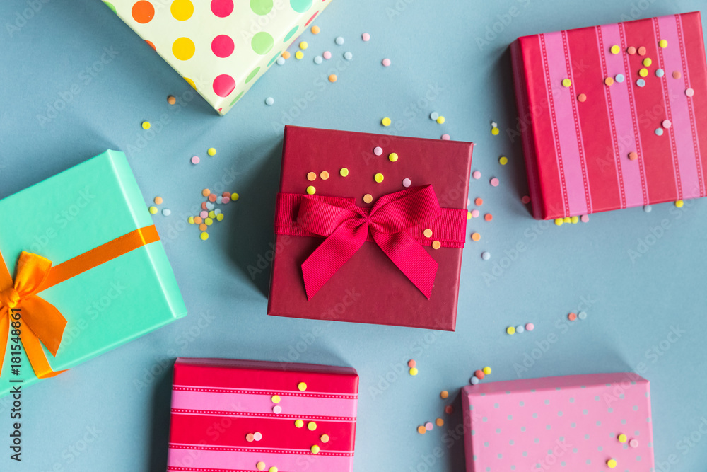 Fototapeta premium Holidays giftboxes on the blue background for mother's day, christmas, birthday