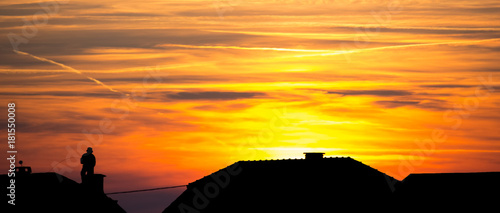 Chimney Sweep on Roof - silhouette