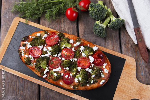 tart quiche with broccoli tomato and goat cheese