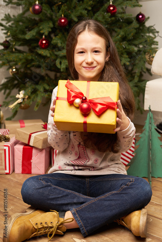 Сhild is surprised by gift for new year