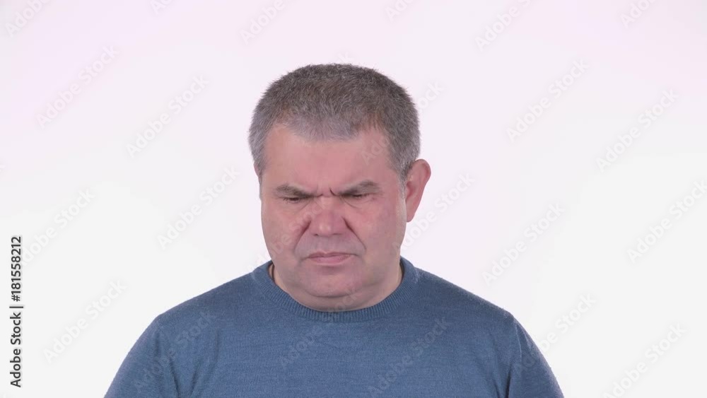 Man thinks about his life. White background . Close up Man thinks about his life. White background . Close up