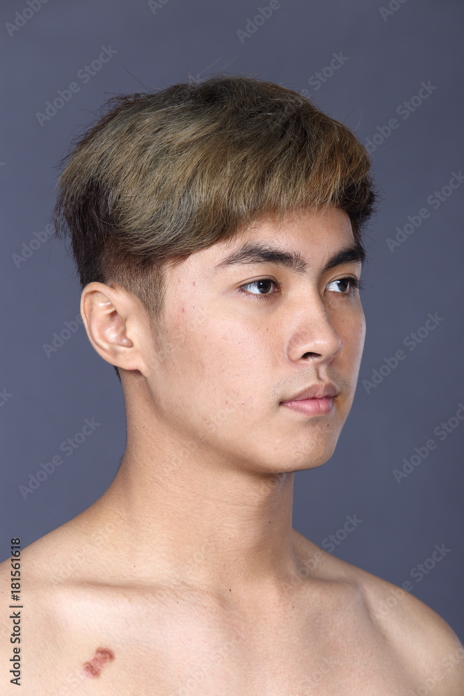 Naklejka premium Asian man before make up hair style. no retouch, fresh face
