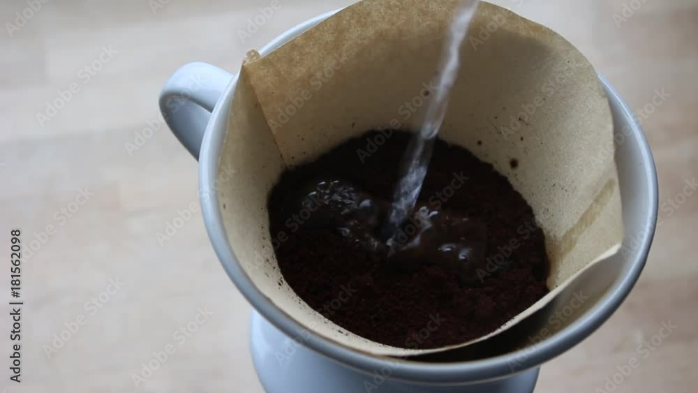 Pour Over Coffee in Cone with Grinds Close-up Pour Over Coffee in Cone with Grinds Close-up