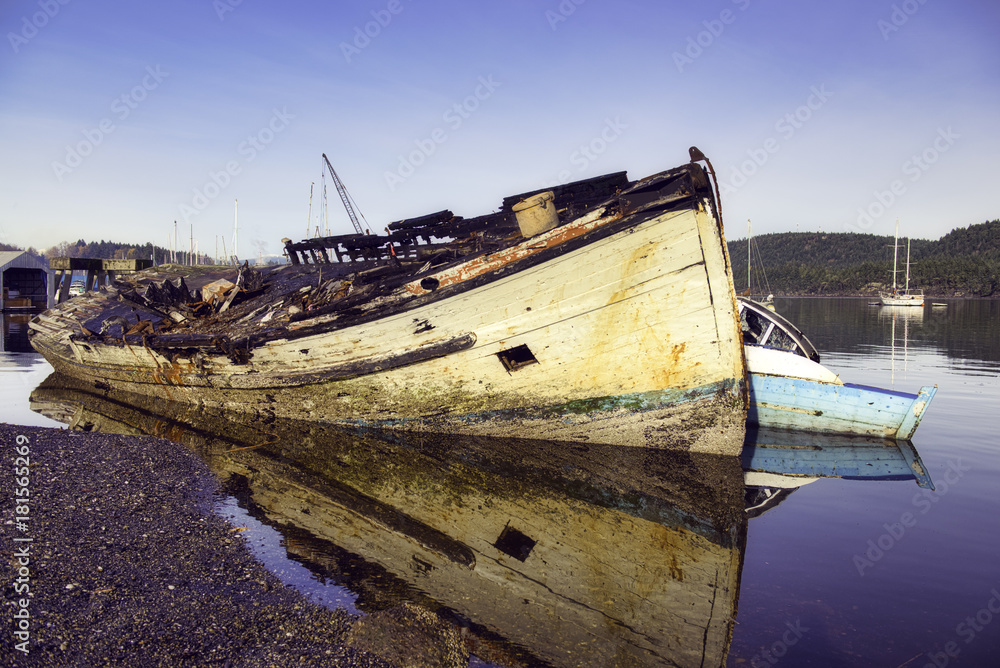 View of shipwreck on Ladysmith marina, taken in Victoria Island, BC, Canada View of shipwreck on Ladysmith marina, taken in Victoria Island, BC, Canada