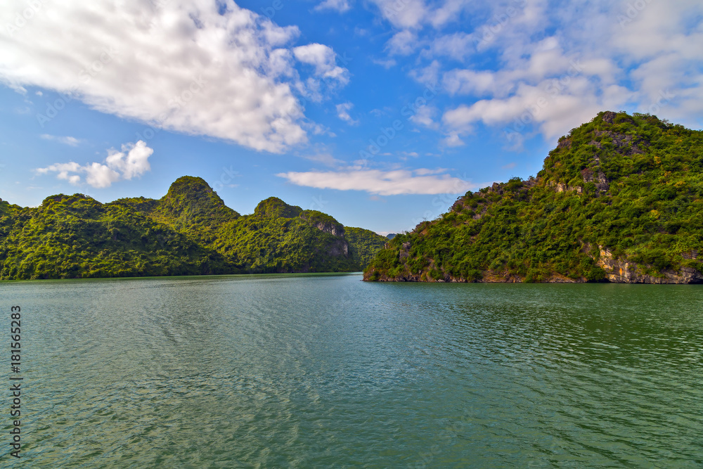 Junks and Floating village in Halong Bay, Vietnam.