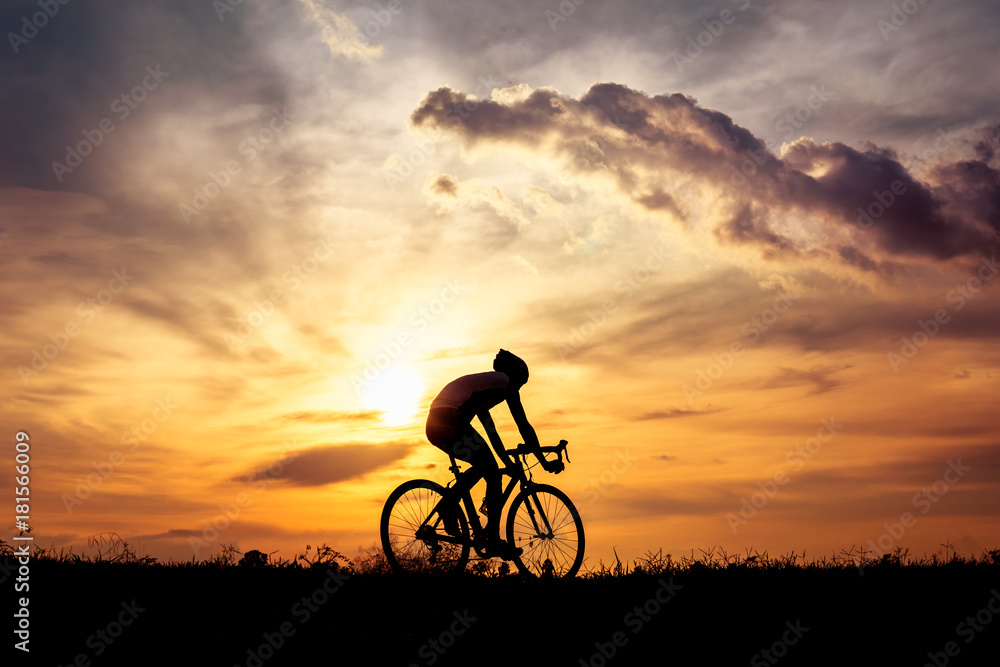 Fototapeta premium Silhouette man cycling
