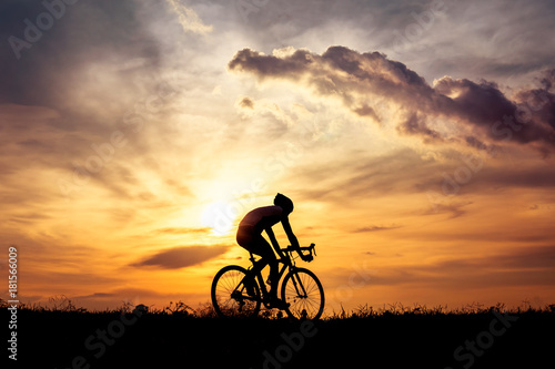 Silhouette man cycling