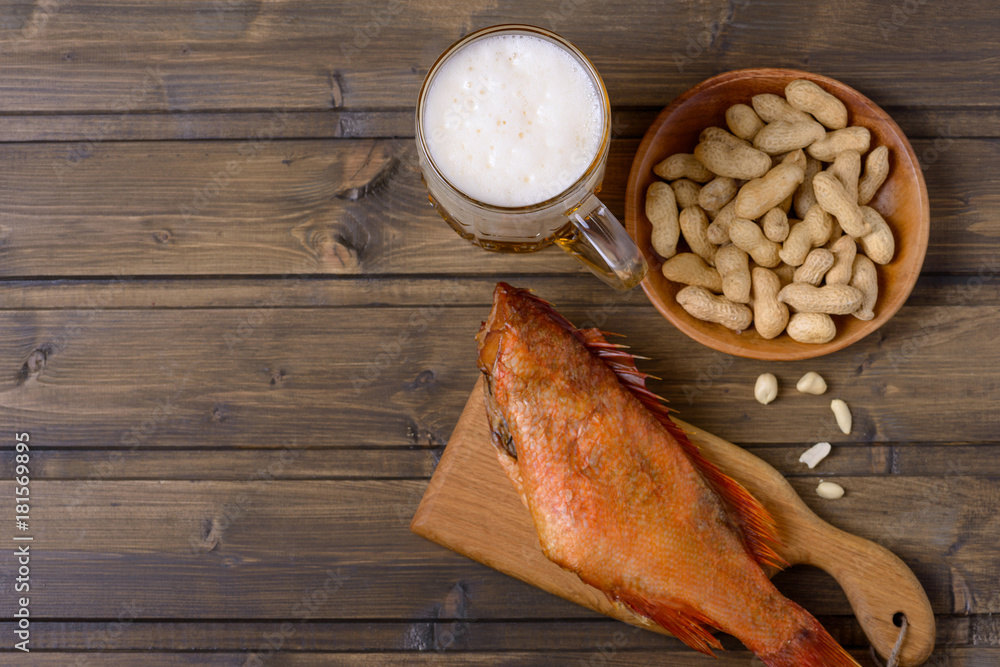 Lager beer mug and fish with peanut Lager beer mug and fish with peanut