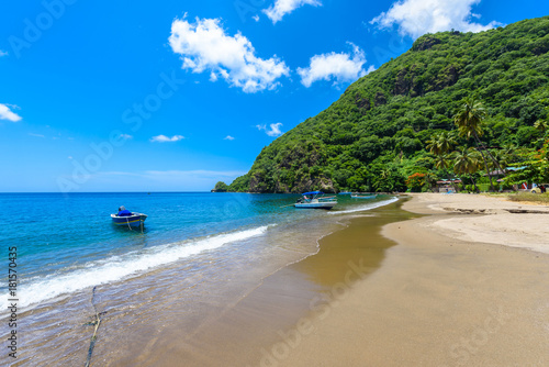 Paradise beach at Soufriere Bay with view to Piton at small town Soufriere in Saint Lucia, Tropical Caribbean Island. © Simon Dannhauer