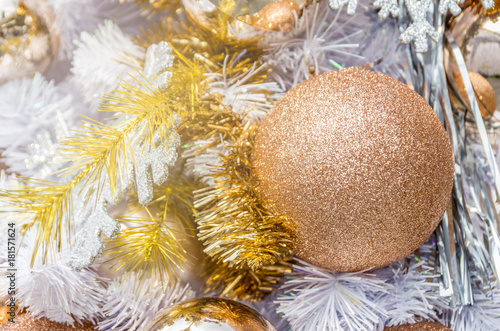 Close up christmas balls and decorations on chrismas tree.