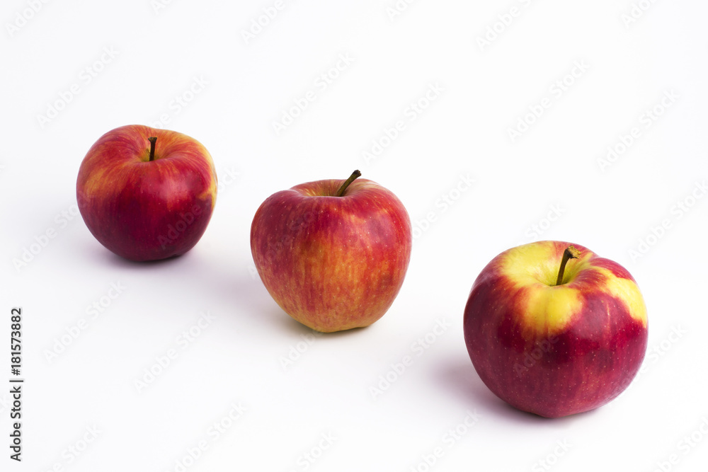Apples on a white background. A group of apples on an isolated white background. Fruits on a white background. Apples on a white background. A group of apples on an isolated white background. Fruits on a white background.