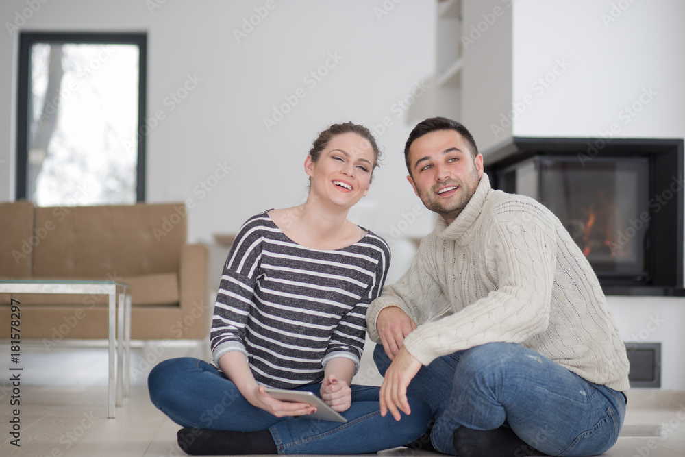 Young Couple using digital tablet on cold winter day Young Couple using digital tablet on cold winter day