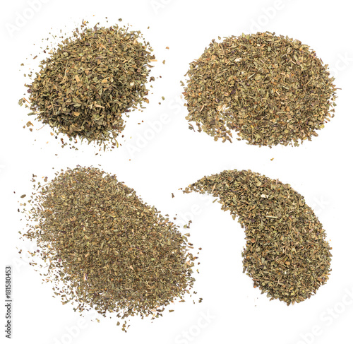 Fototapeta Naklejka Na Ścianę i Meble -  Heap of Dried Basil Flakes Isolated