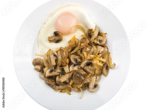 Fried eggs with onions and mushrooms