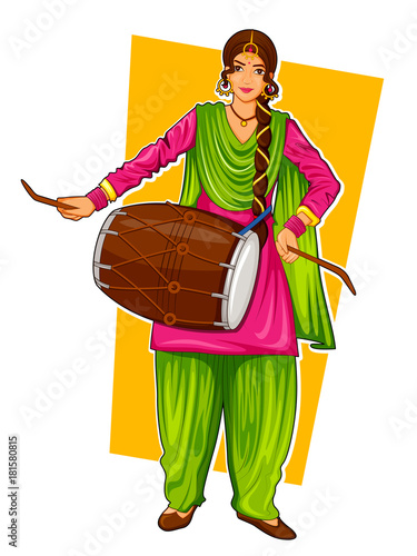 Sikh Punjabi Sardar woman playing dhol and dancing bhangra on holiday like Lohri or Vaisakhi