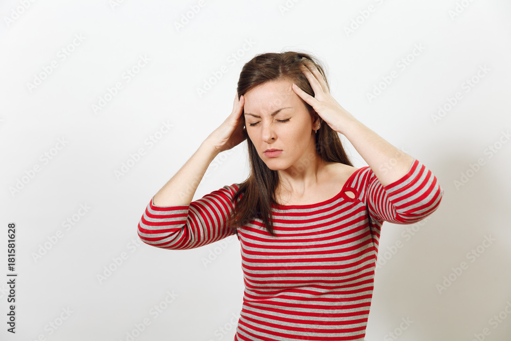 Pretty European worried and pensive brown-haired woman with healthy clean skin and headache, dressed in red and grey clothes lost in thought and conjectures, on a white background. Emotions concept. Pretty European worried and pensive brown-haired woman with healthy clean skin and headache, dressed in red and grey clothes lost in thought and conjectures, on a white background. Emotions concept.
