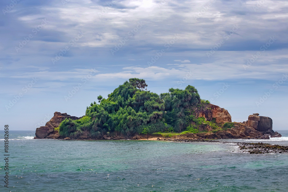 Fototapeta premium Small tropical island in the ocean