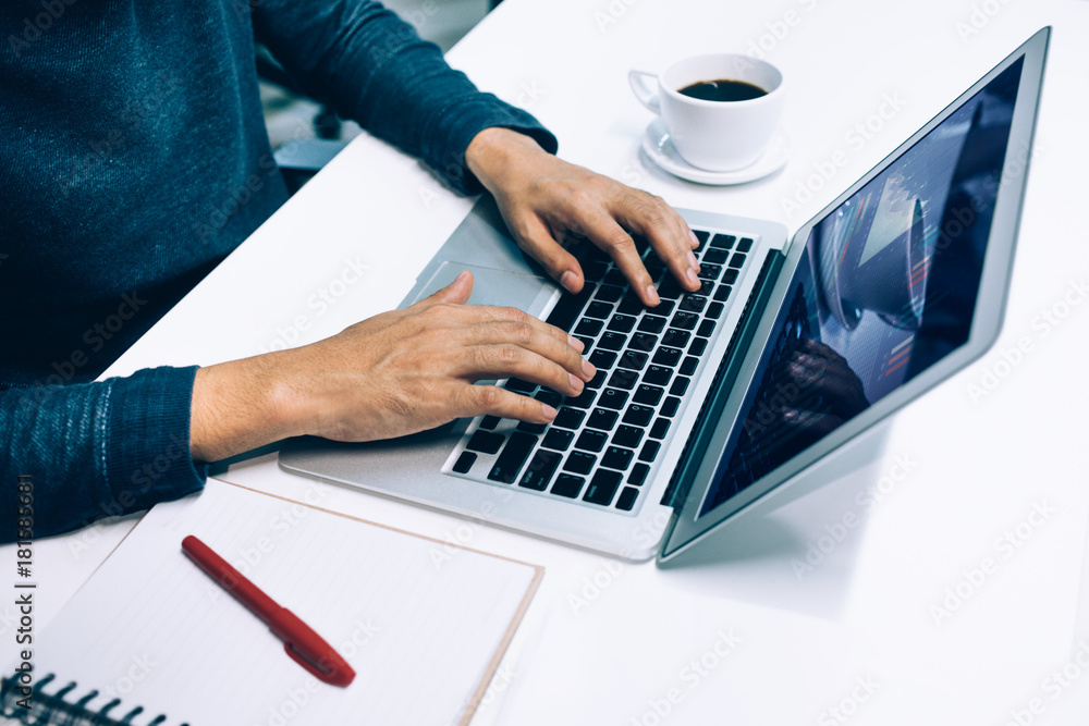 Male using computer laptop in office.business lifestyle,organization concepts Male using computer laptop in office.business lifestyle,organization concepts