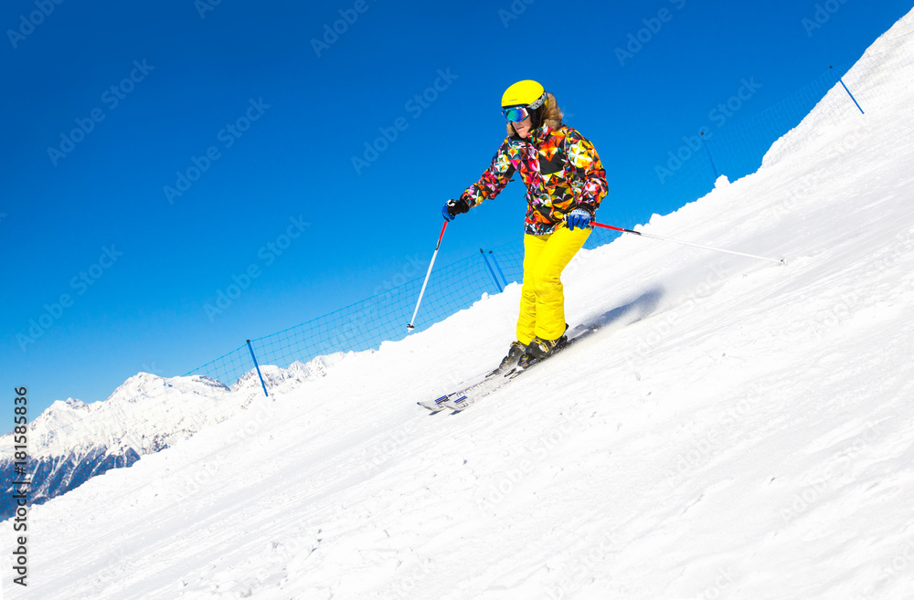man skiing  in the mountains
