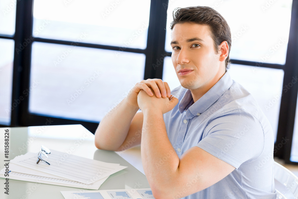 Fototapeta premium Pensive businessman at office
