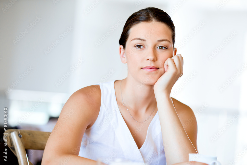 Happy young woman with cup of tea or coffee at home Happy young woman with cup of tea or coffee at home