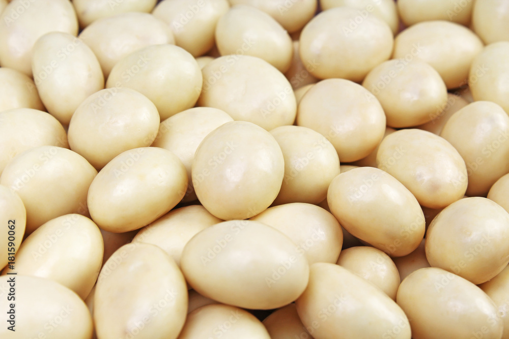 White chocolate balls. White chocolate as background texture pattern. Photo. White chocolate balls. White chocolate as background texture pattern. Photo.
