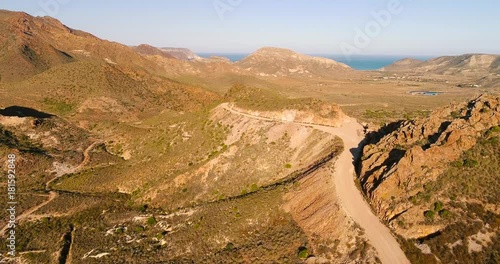 Dirt track through the Rodalquilar Valley, in Cabo de Gata Natural Park, southern Spain photo