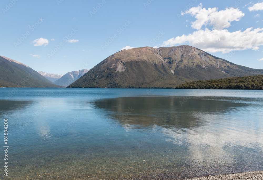Mount Robert reflecting in lake Rotoiti in Nelson Lakes National Park, New Zealand Mount Robert reflecting in lake Rotoiti in Nelson Lakes National Park, New Zealand