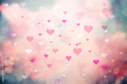 Pink red colored blurry Valentine's Day Hearts illustration background.