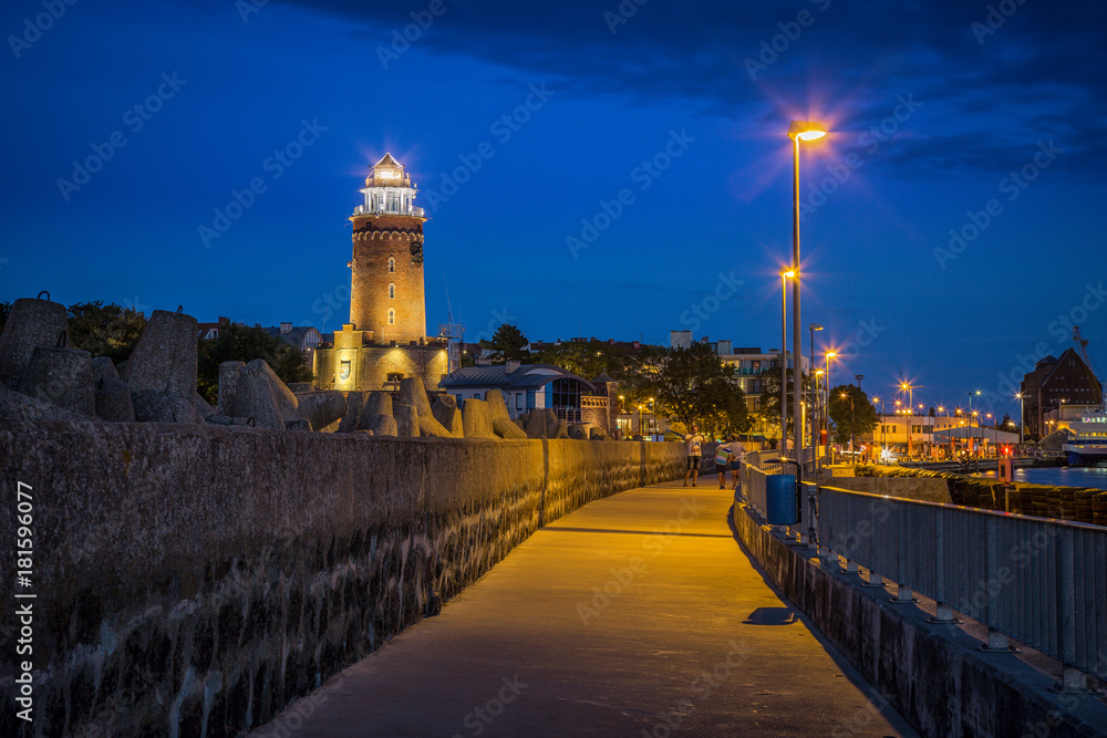 Lighthouse in Baltic coast during blue hour.