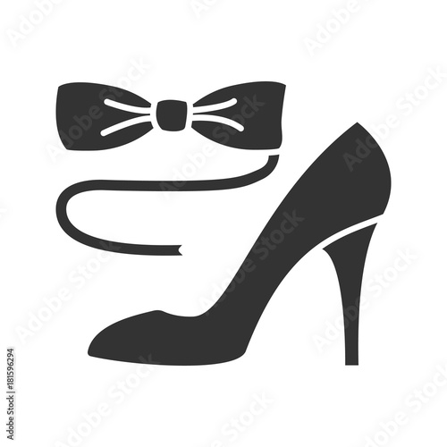 Bow tie and high heel shoe glyph icon