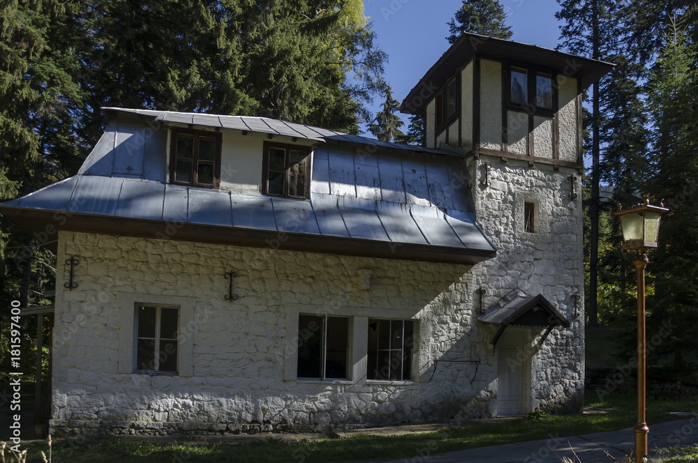 Majestic ancient building of Hydroelectric plant in the old park Tsarska or Royal Bistritsa near by resort Borovets, Rila mountain, Bulgaria Majestic ancient building of Hydroelectric plant in the old park Tsarska or Royal Bistritsa near by resort Borovets, Rila mountain, Bulgaria
