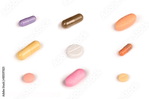 some colorful pills isolated on a white background.psd