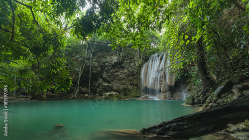 Breathtaking green waterfall at deep forest  Erawan waterfall located Kanchanaburi Province  Thailand