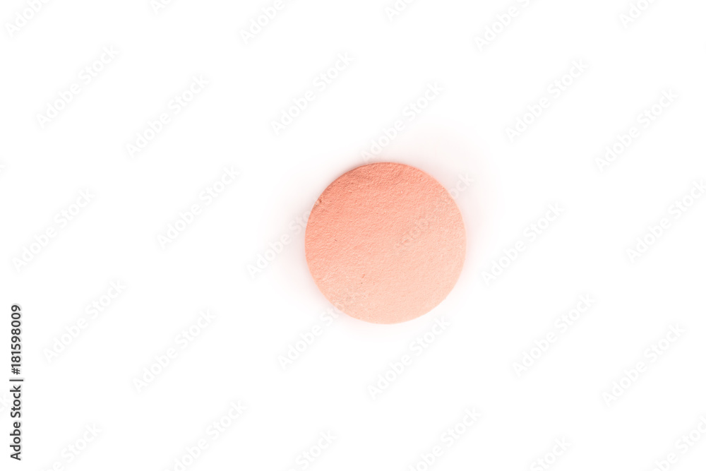 close-up of a salmon pink pill from above isolated on a white background.psd close-up of a salmon pink pill from above isolated on a white background.psd