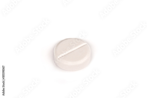 close-up of a white pill isolated on a white backgound.psd