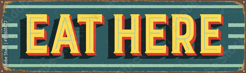 Vintage metal sign - Eat Here - Vector EPS10. Grunge and rusty effects can be easily removed for a cleaner look.