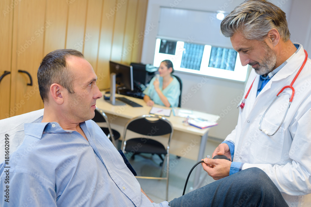 checking the patient checking the patient