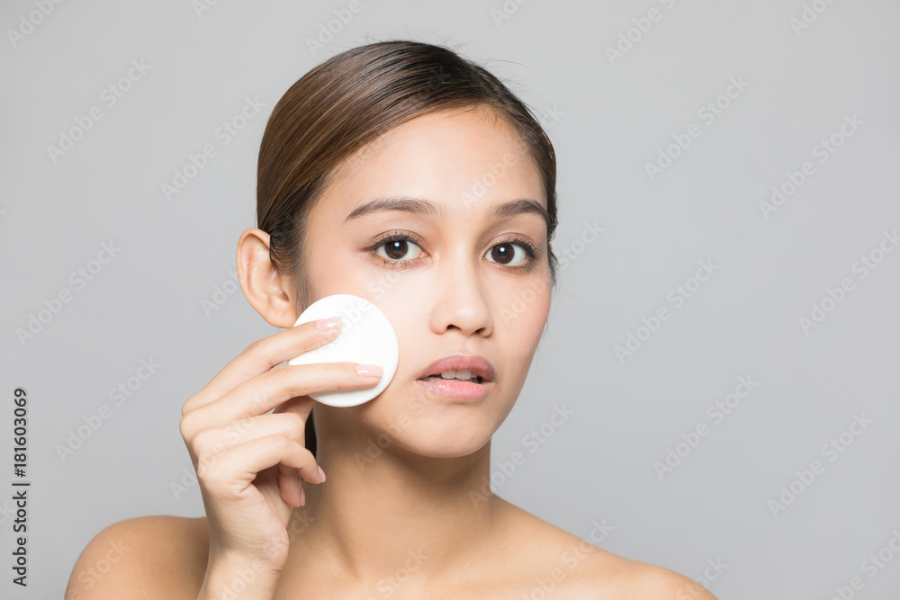 Young woman making up. Young woman making up.