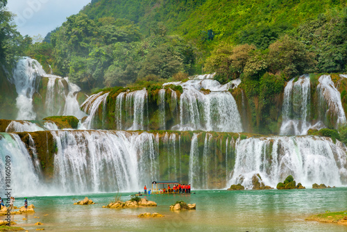 Amazing Ban Gioc waterfall flow down fluted in Cao Bang province  Vietnam.  Ban Gioc waterfall is one of the top 10 waterfalls in the world and along Vietnamese and Chinese border