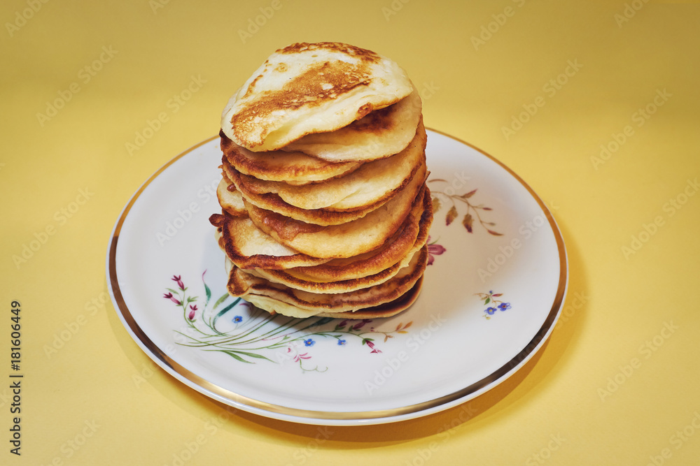 pancakes on a white plate pancakes on a white plate