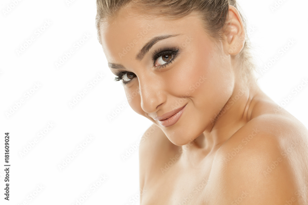 Portrait of beautiful young woman with makeup on white background Portrait of beautiful young woman with makeup on white background