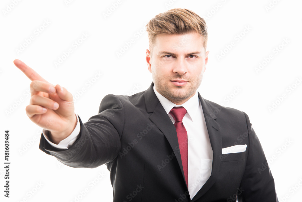 Portrait of handsome corporate business man showing denial gesture Portrait of handsome corporate business man showing denial gesture