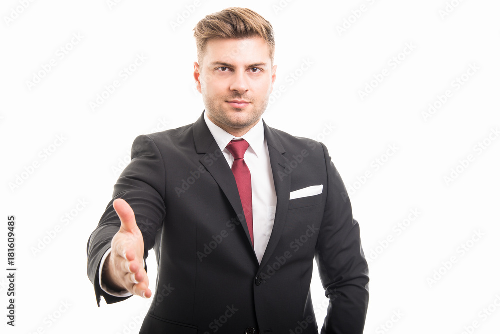 Portrait of handsome corporate business man offering hand shake Portrait of handsome corporate business man offering hand shake